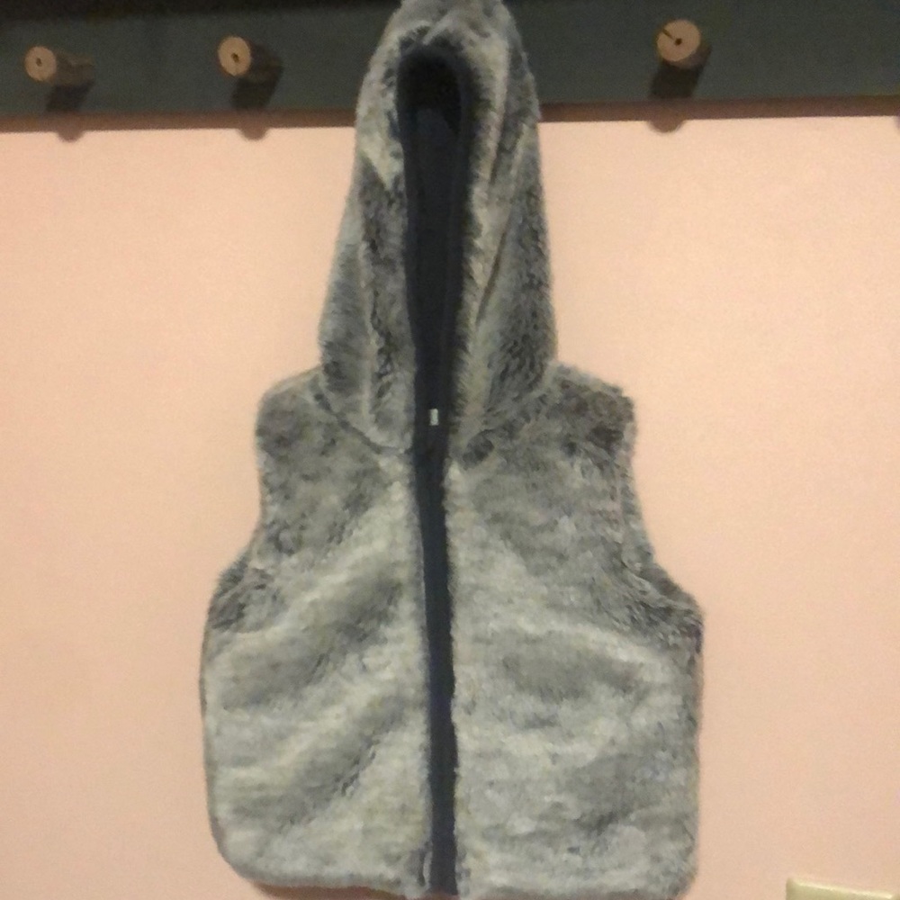 Monsoon sleeveless hooded vest. Silver Faux fur, navy interior. Size 18-24m